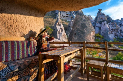 woman-bohemian-dress-sitting-traditional-cave-house-cappadocia-turkey_335224-611-410x270